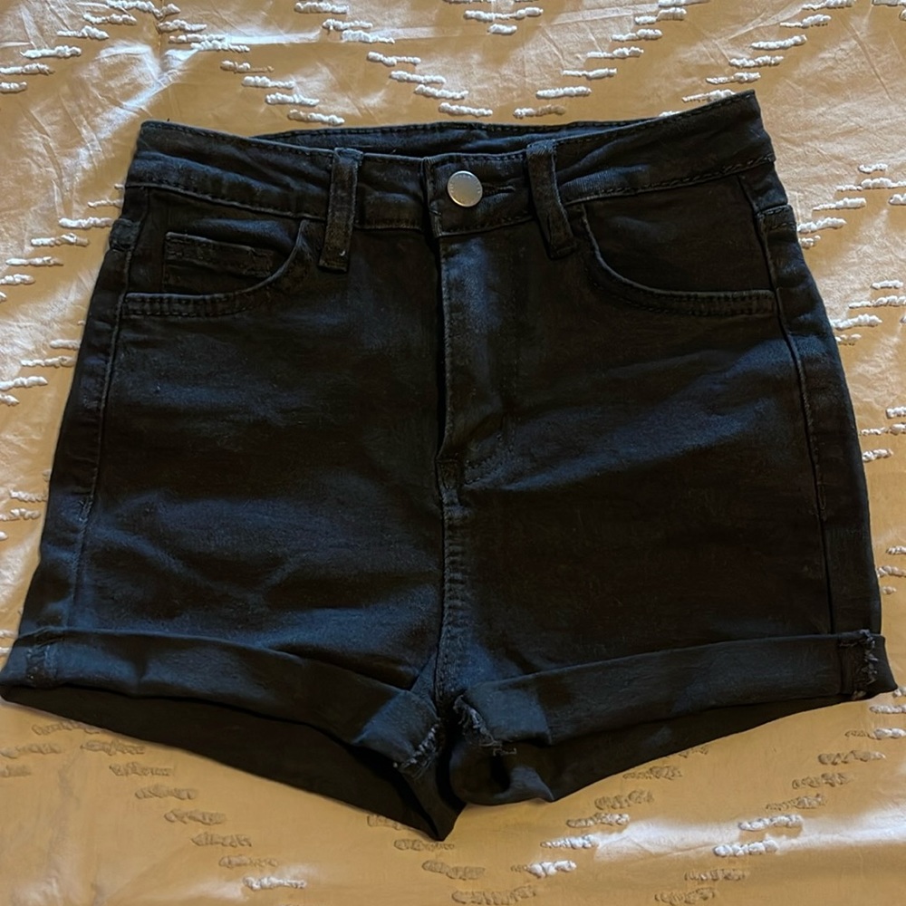 Teen black SHEIN shorts.